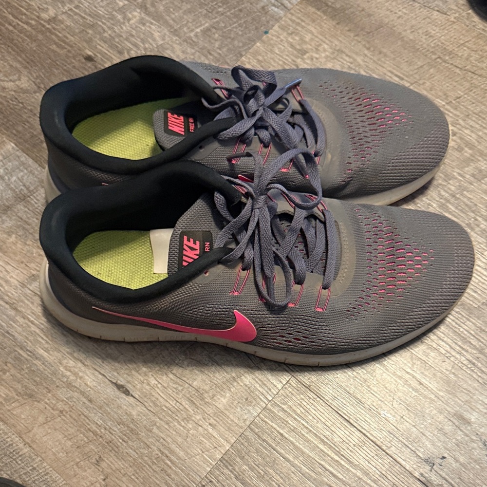 Nike Gray Sneakers with Pink Highlights